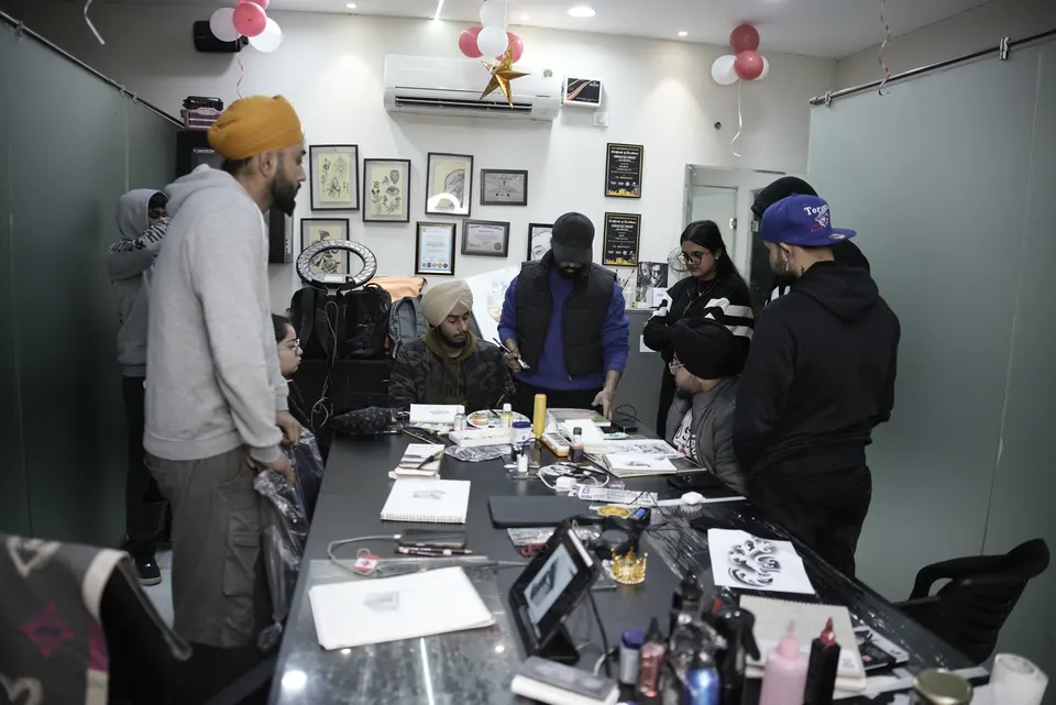 Tattoo training in progress at the Kamz Inkzone Academy