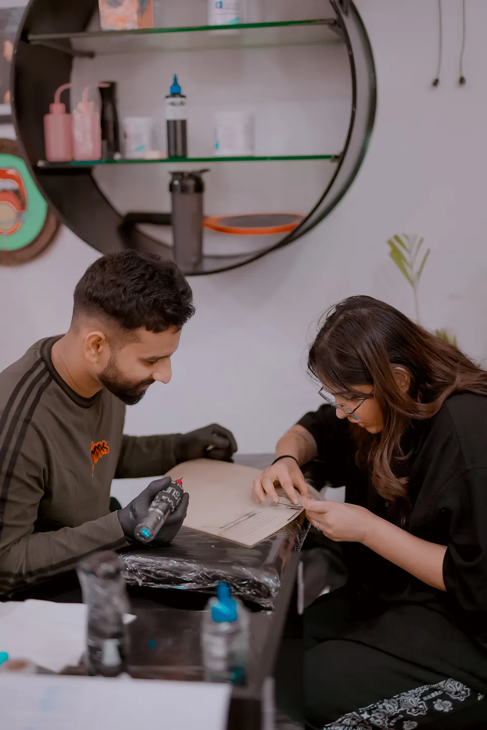 Tattoo training in progress at the Kamz Inkzone Academy