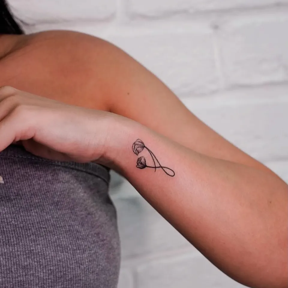 Minimal tattoo by Kamz Inkzone