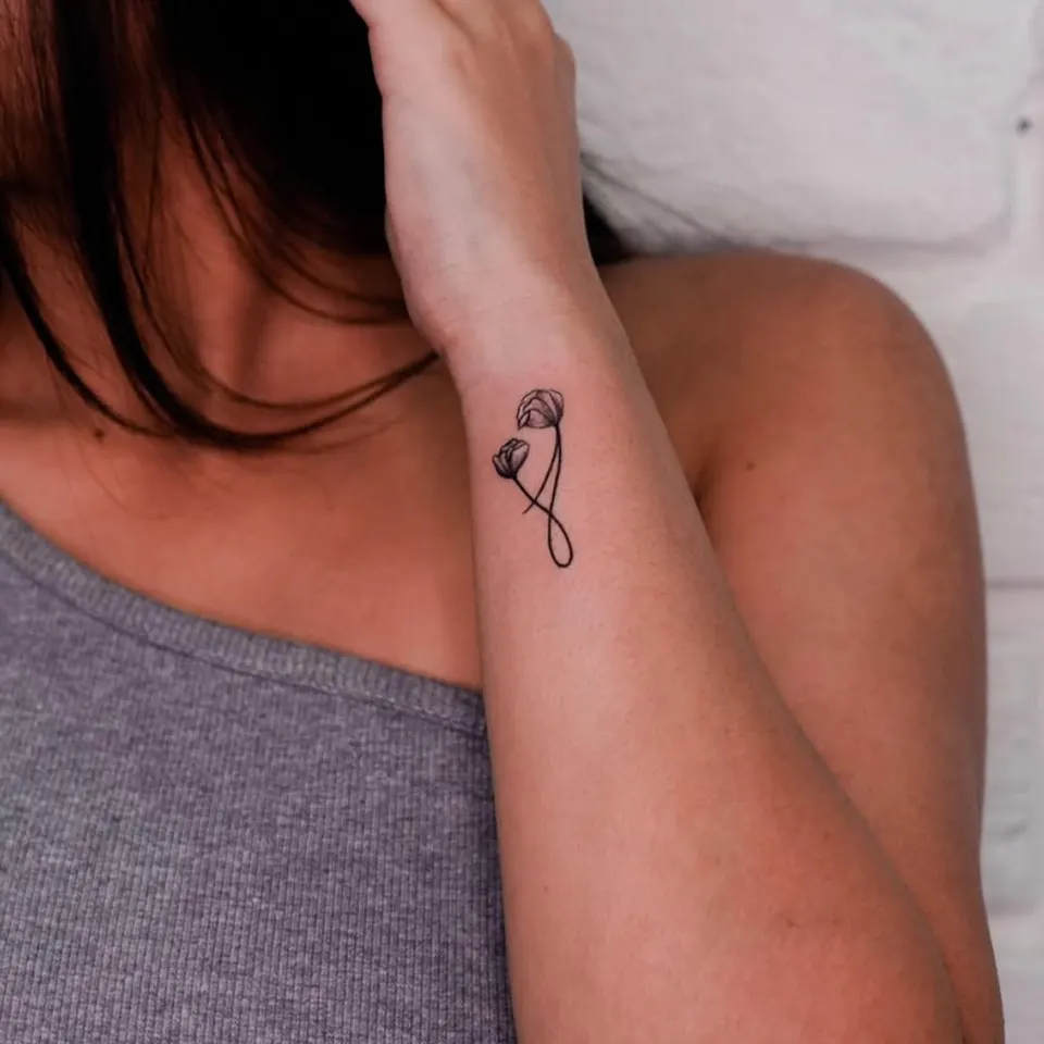 Minimal tattoo by Kamz Inkzone
