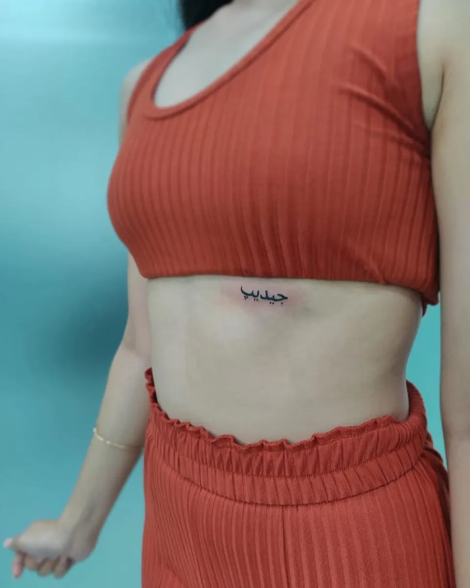 Minimal tattoo by Kamz Inkzone